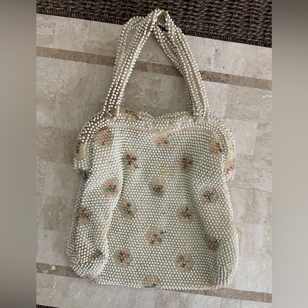 Vintage beaded white bag with pale pink flowers.
